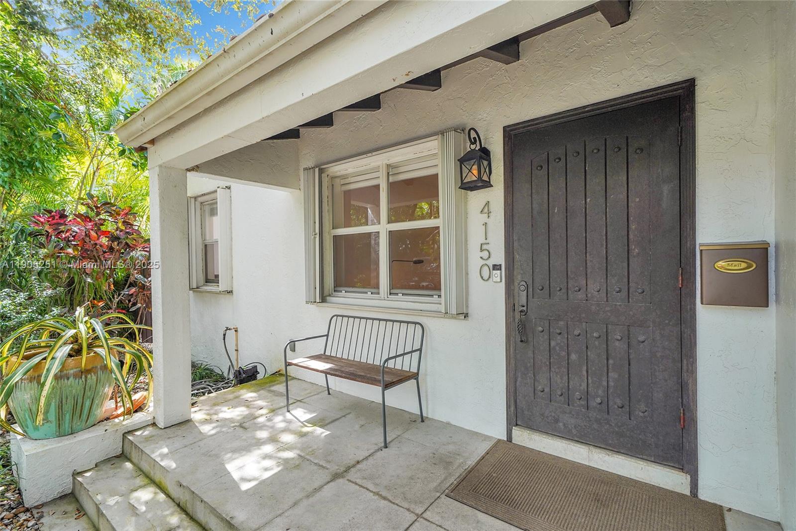 4150 Ventura Avenue Miami, FL 33133 - Photo 2 of 23 a view of a house with backyard and sitting area