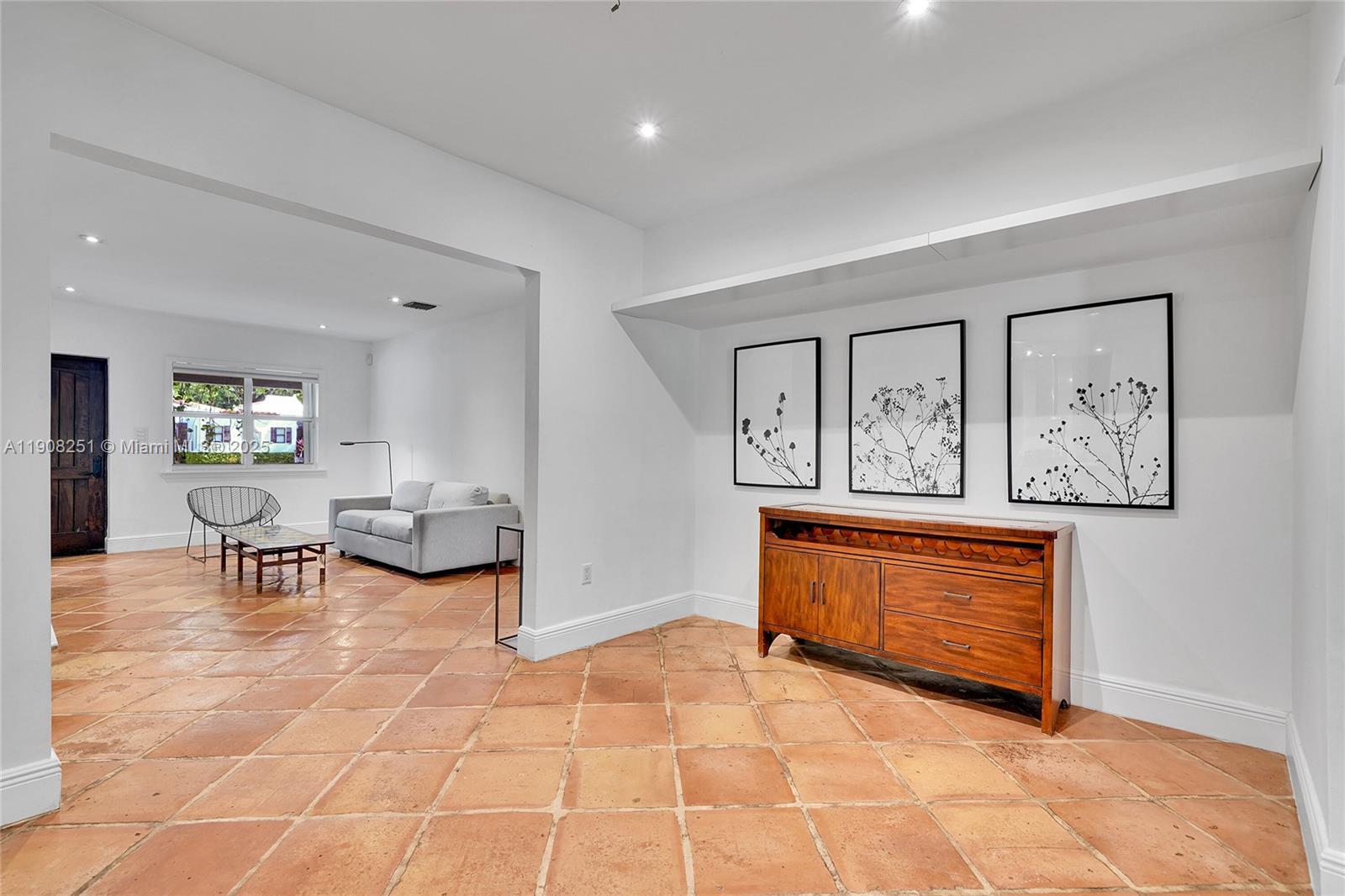 4150 Ventura Avenue Miami, FL 33133 - Photo 4 of 23 a view of living room filled with furniture and rug