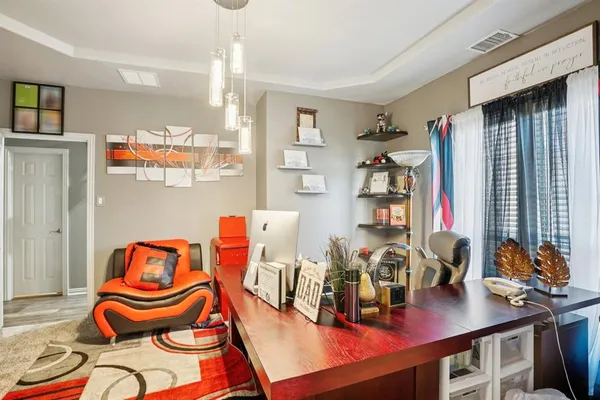 a room with musical instruments and lots of equipment