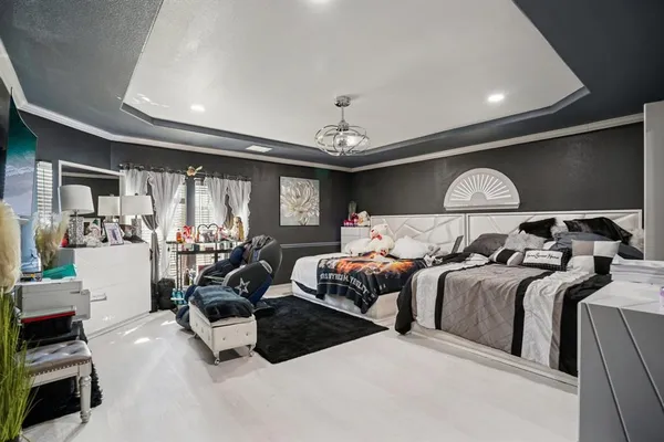 a bed room with bed and window