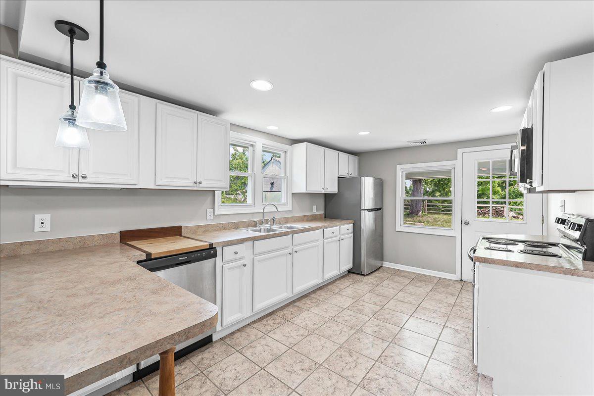 1019 Riverside Drive Pottstown, PA 19465 - Photo 12 of 36 Bright and airy modern kitchen space.