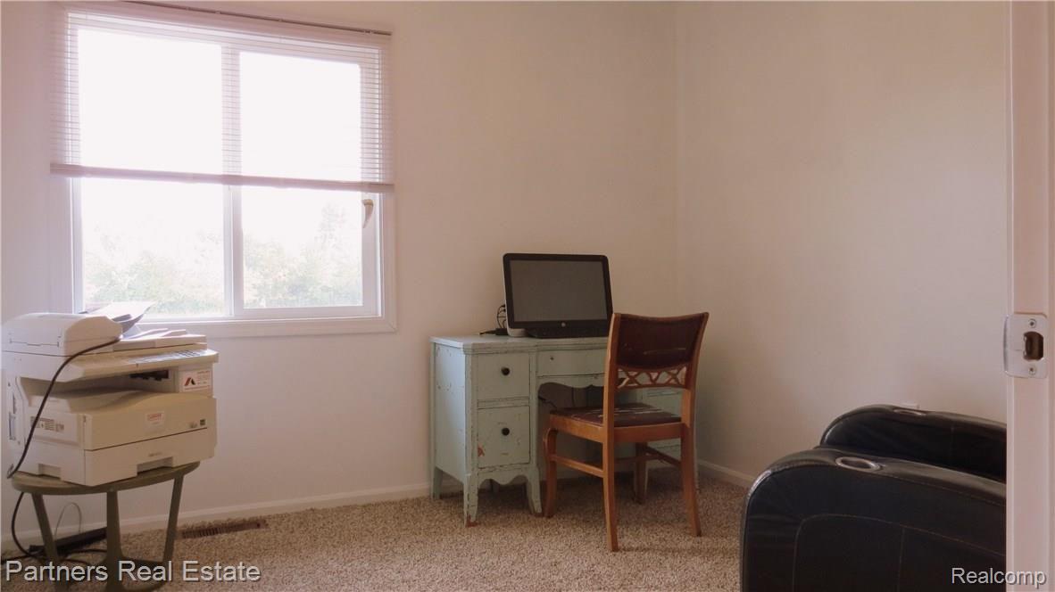4850 Deal Road Fowlerville, MI 48836 - Photo 33 of 49 Of the Three Additional Bedrooms this one is Currently Setup as an Office.