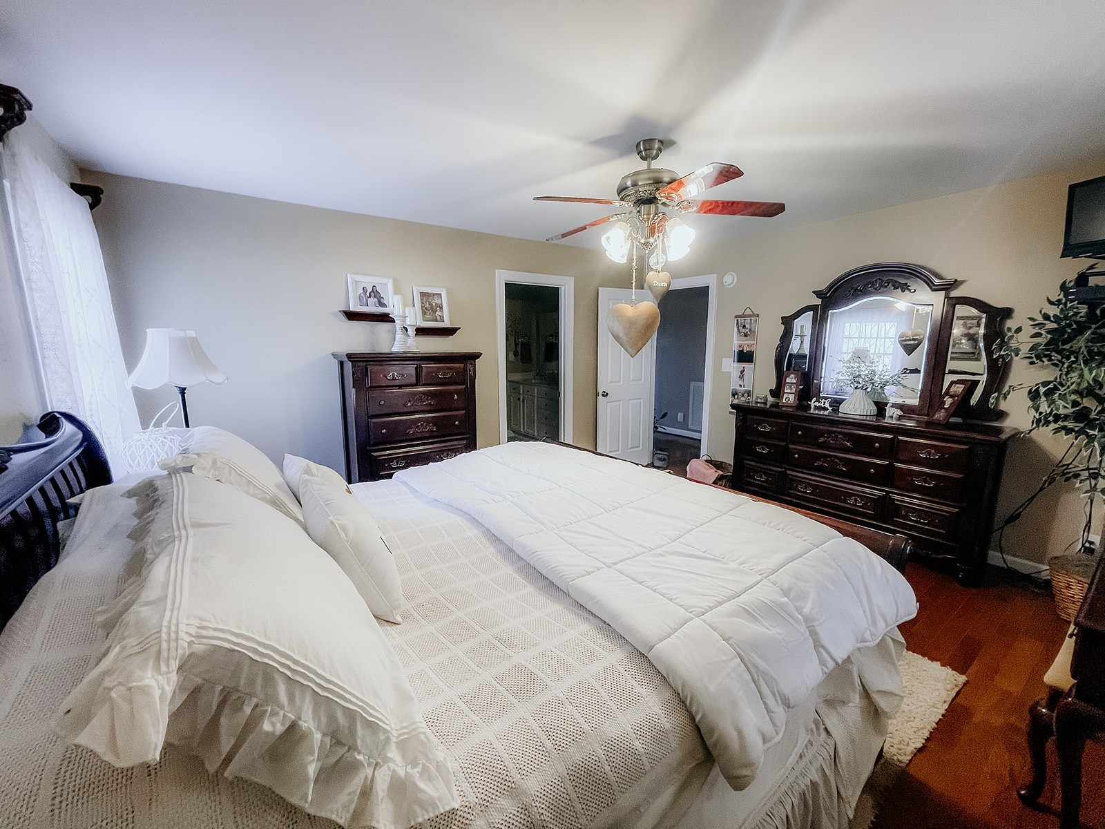 6713 Pilot Lane Lyles, TN 37098 - Photo 17 of 20 a bedroom with a bed and a chandelier