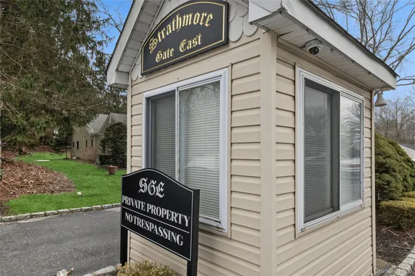 a view of a door with a bench