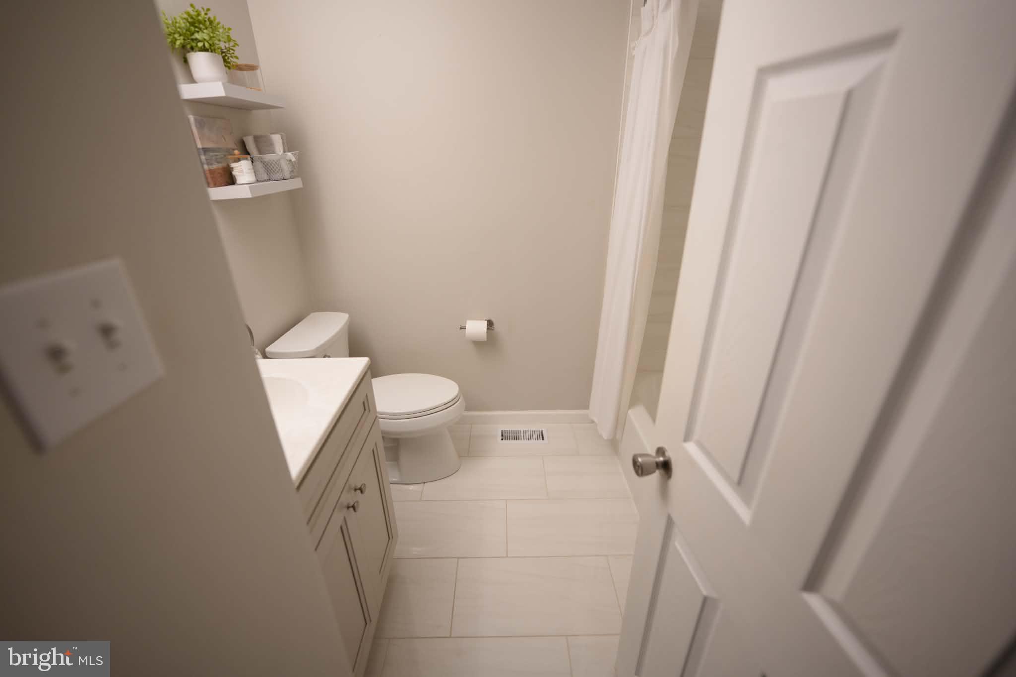 809 Anthony Road Atco, NJ 08004 - Photo 23 of 38 Newly tiled hallway bath