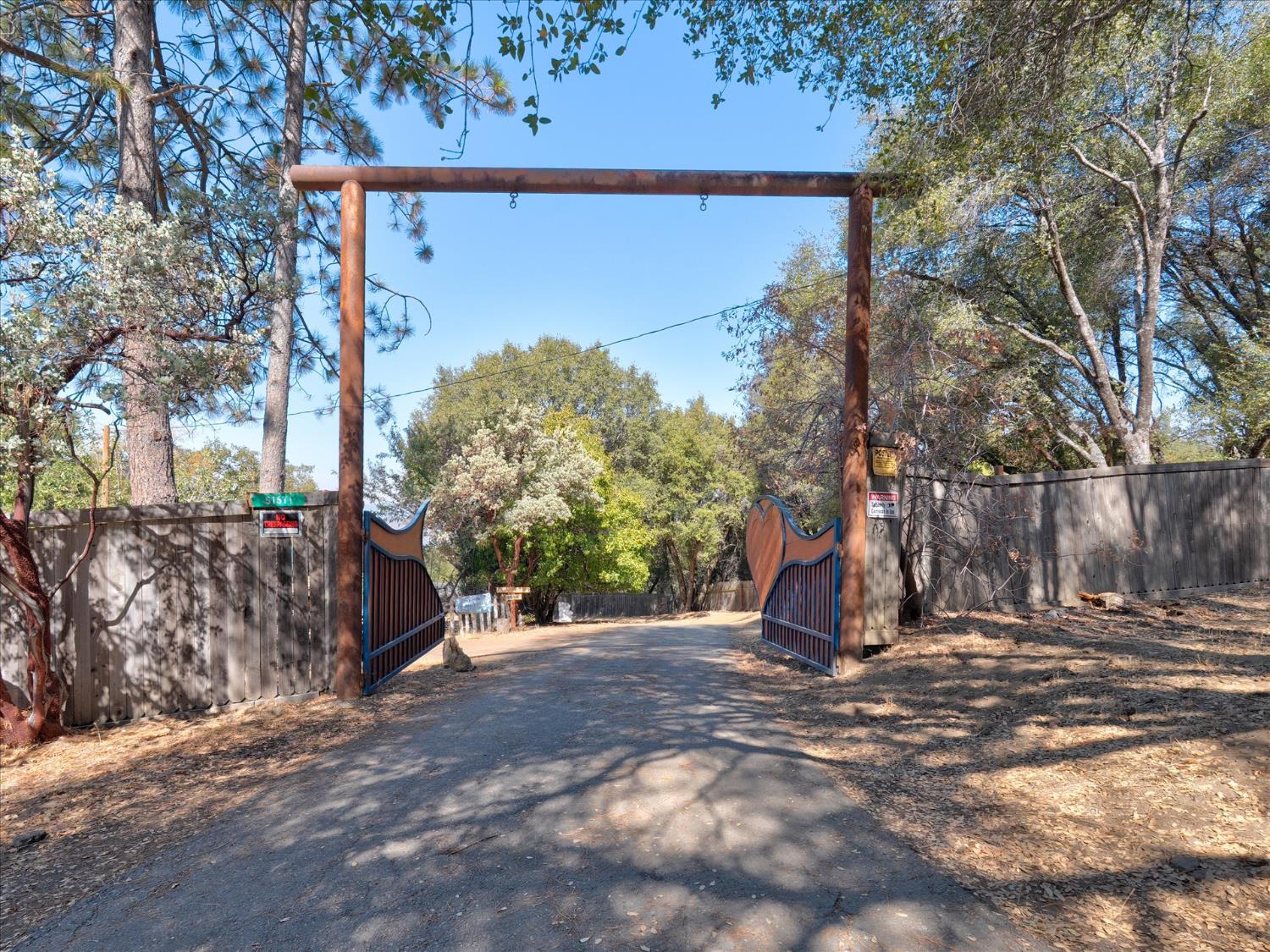 51571 Coyote Ridge Road Oakhurst, CA 93644 - Photo 5 of 83 Gated entrance to the property