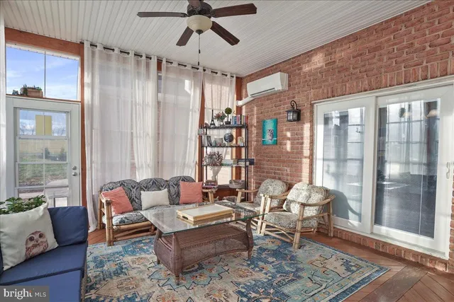 a bathroom with a sink a large mirror and vanity