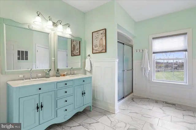 a room with furniture and a chandelier