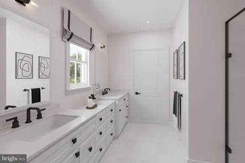 a bathroom with double vanity sink a mirror and a shower