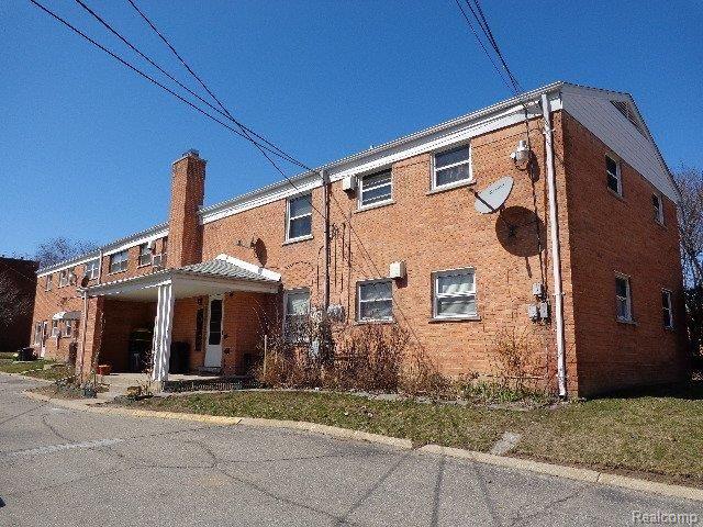 2821 West Thirteen Mile Road, Unit 2 Royal Oak, MI 48073 - Photo 6 of 23 261-843021 Back Right.JPG