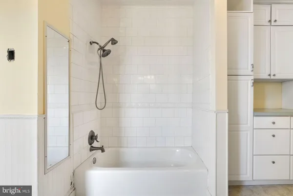 a bathroom with a bathtub