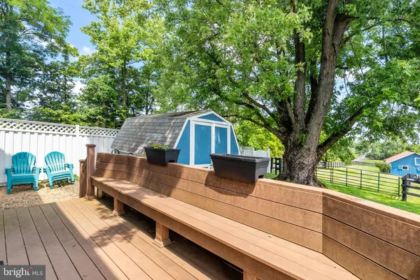 a view of a deck with furniture