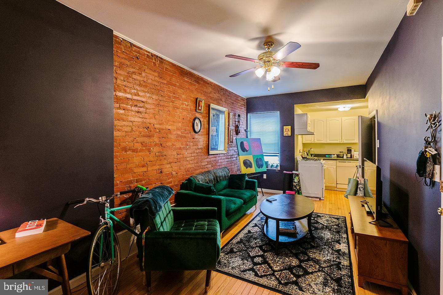 620 South 3rd Street, Unit 2 Philadelphia, PA 19147 - Photo 2 of 10 a work room with furniture and wooden floor