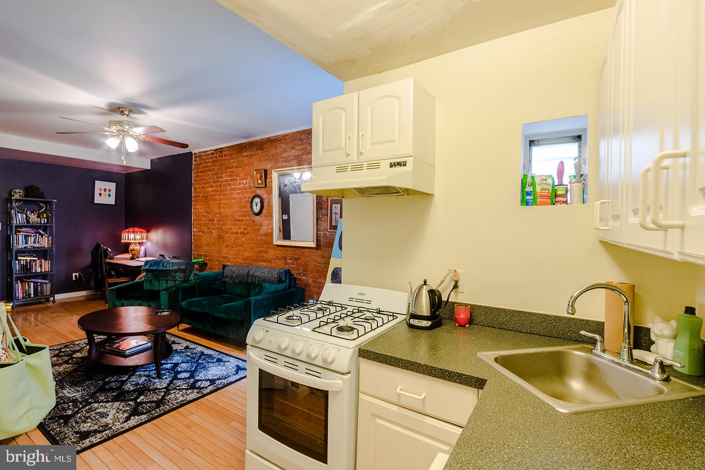 620 South 3rd Street, Unit 2 Philadelphia, PA 19147 - Photo 5 of 10 a kitchen with a stove and a sink