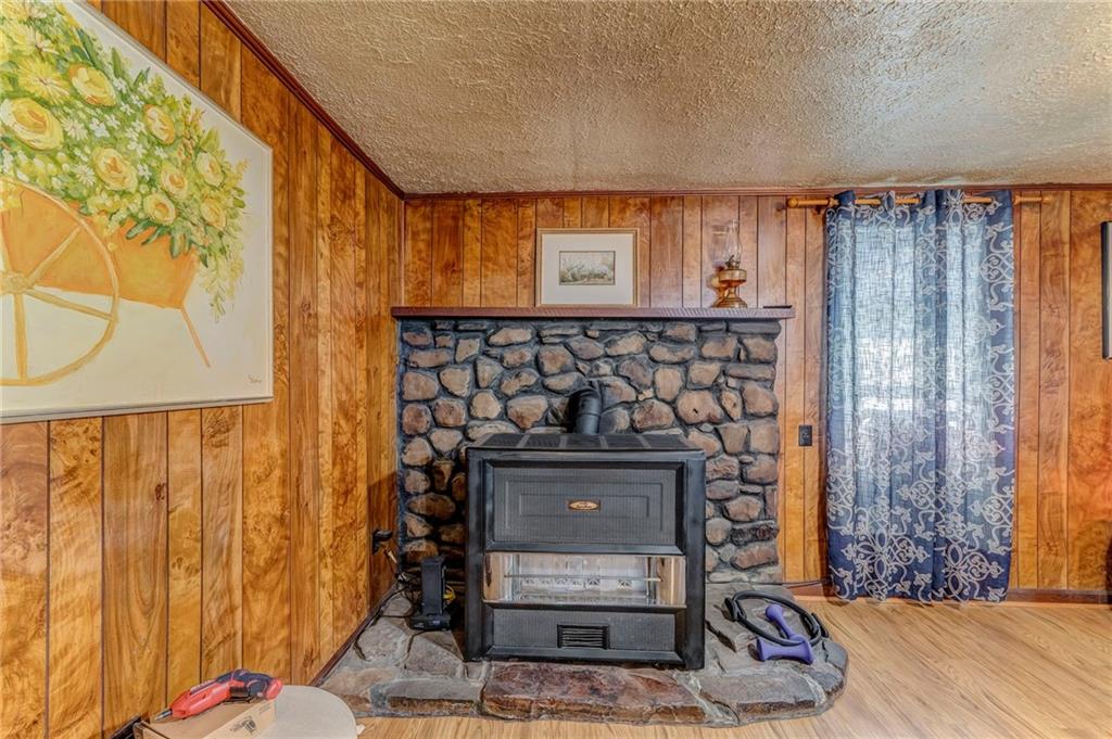 1525 Sloppy Floyd Lake Road Summerville, GA 30747 - Photo 8 of 16 a bedroom with a bed and a window