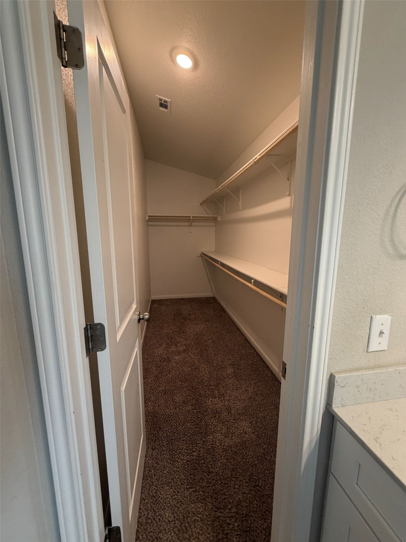 248 Falling Star Lane Georgetown, TX 78628 - Photo 12 of 16 A well-lit, generous closet provides ample storage solutions.