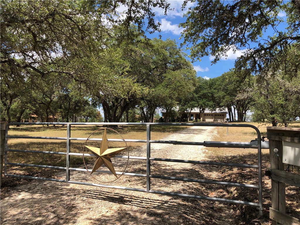 2933 Mt Sharp Road Wimberley, TX 78676 - Photo 1 of 1 Electronic gated home sitting "peacefully and privately" on a hill.