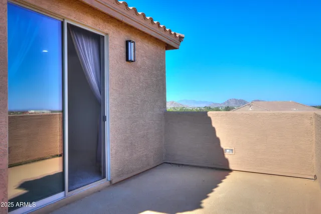 a balcony view with an outdoor space