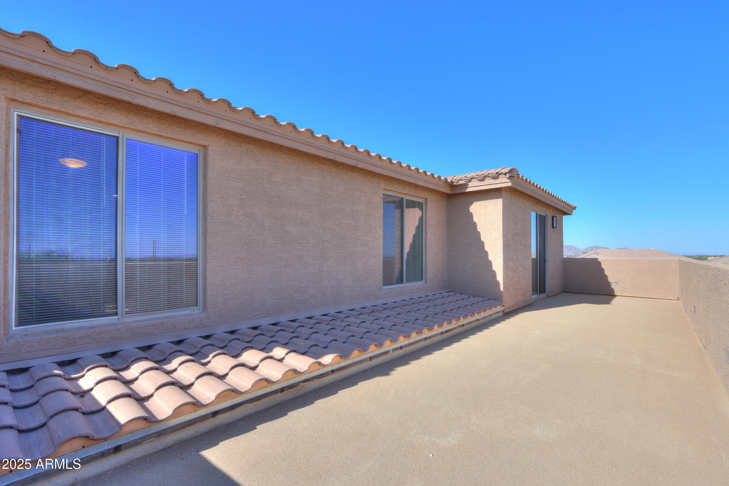 53304 West Barnes Road Maricopa, AZ 85139 - Photo 42 of 75 a house view with a backyard space
