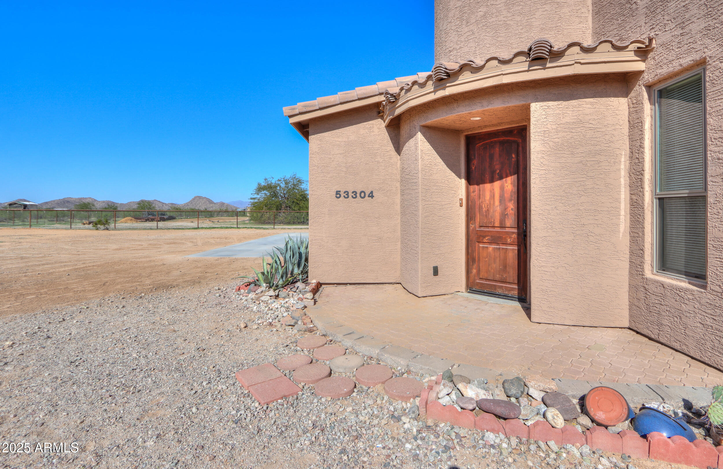 53304 West Barnes Road Maricopa, AZ 85139 - Photo 47 of 75 a view of a house with a yard
