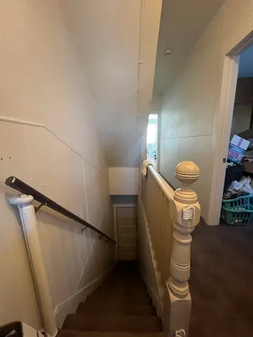 a view of a hallway with entryway