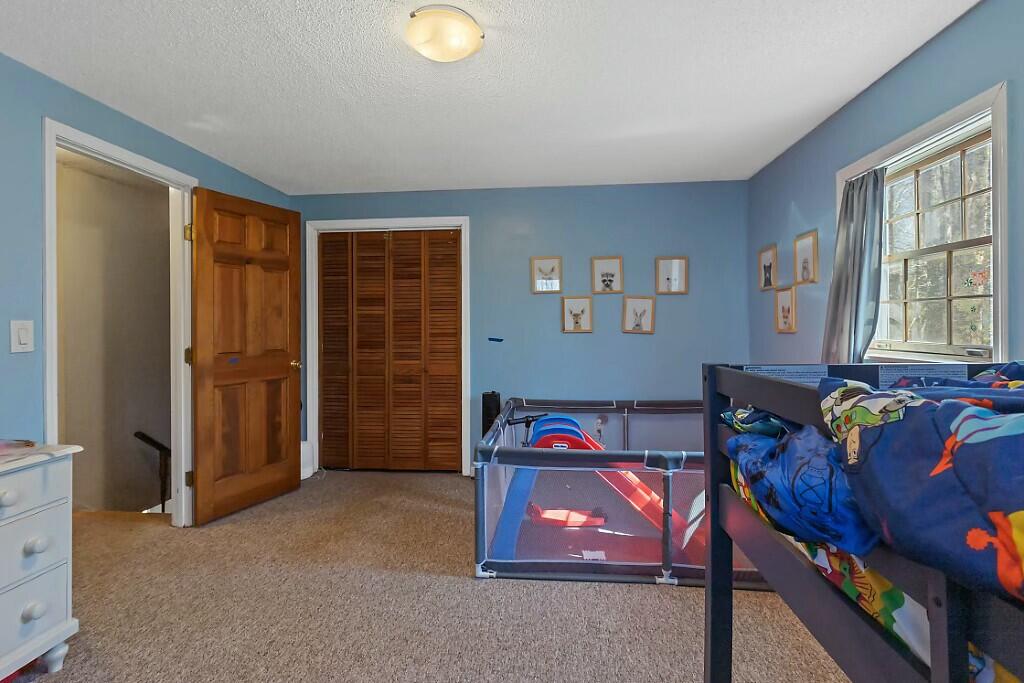 76 Wesley Road Unity, ME 04988 - Photo 22 of 42 Upstairs bedroom