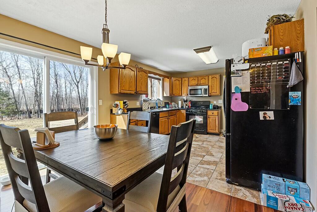 76 Wesley Road Unity, ME 04988 - Photo 6 of 42 Dining room and kitchen