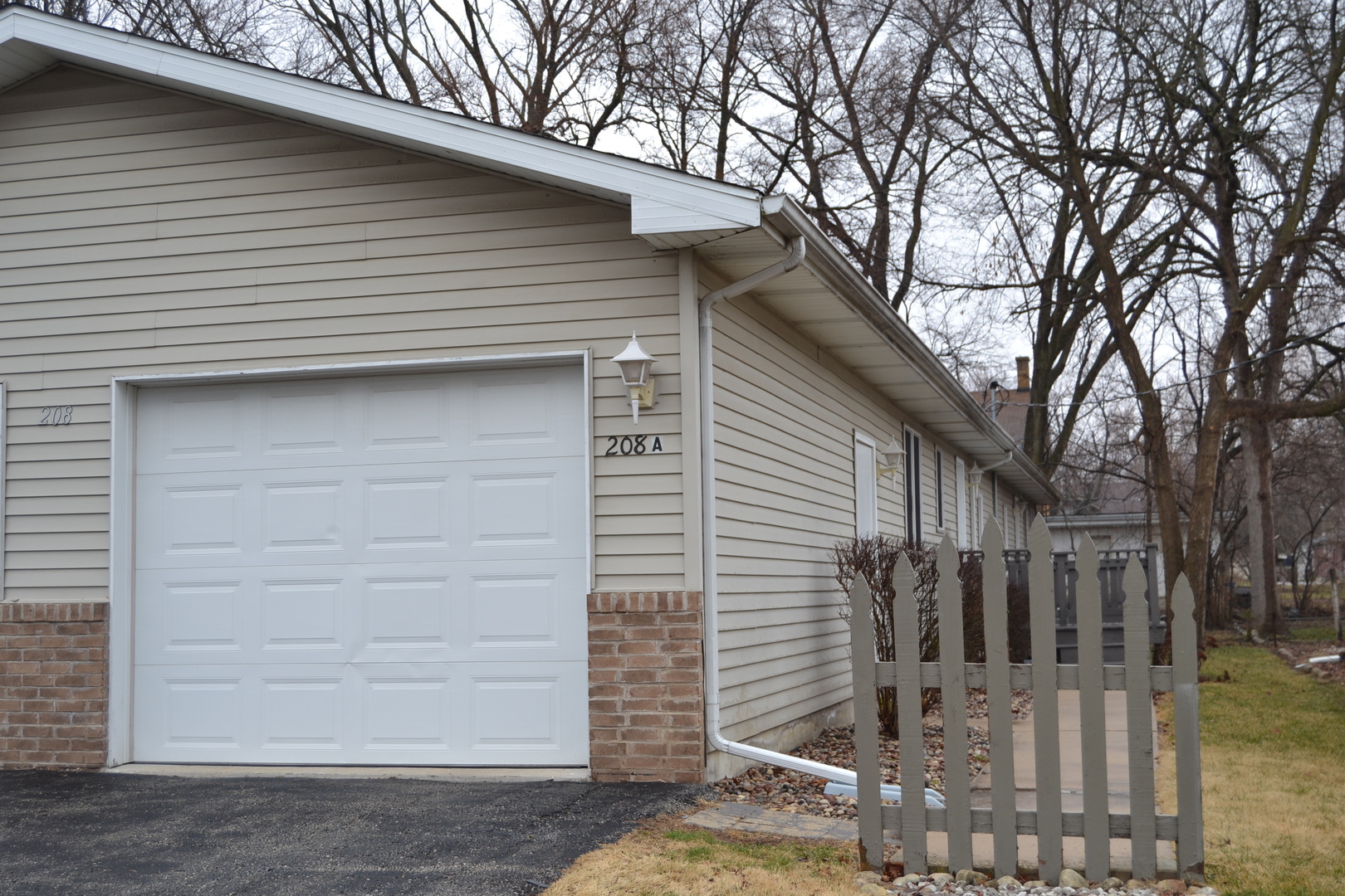 208 Nebraska Street, Unit A Ottawa, IL 61350 - Photo 13 of 14 a view of a house with a garage