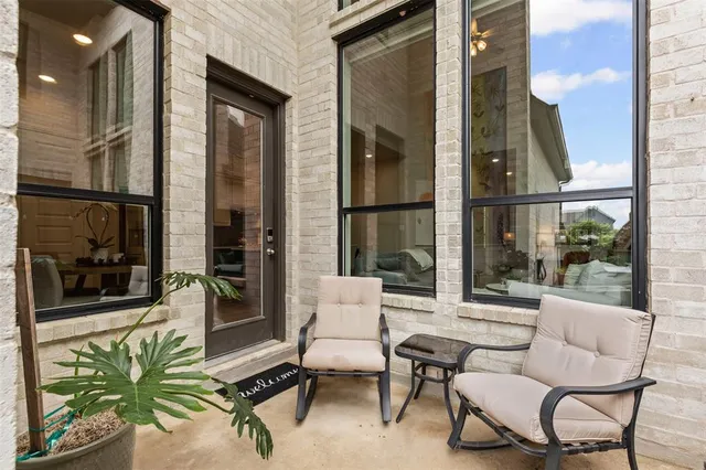 a bathroom with a sink a toilet and a window