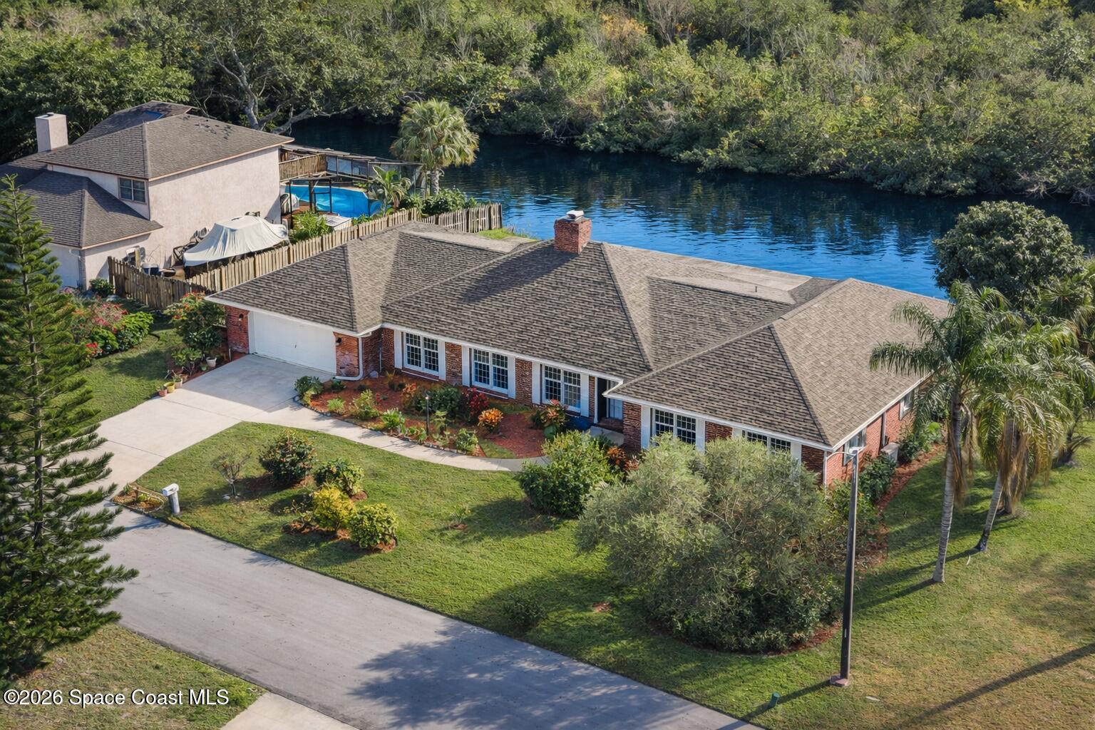 835 Sunswept Road Northeast Palm Bay, FL 32905 - Photo 3 of 46 Front Image