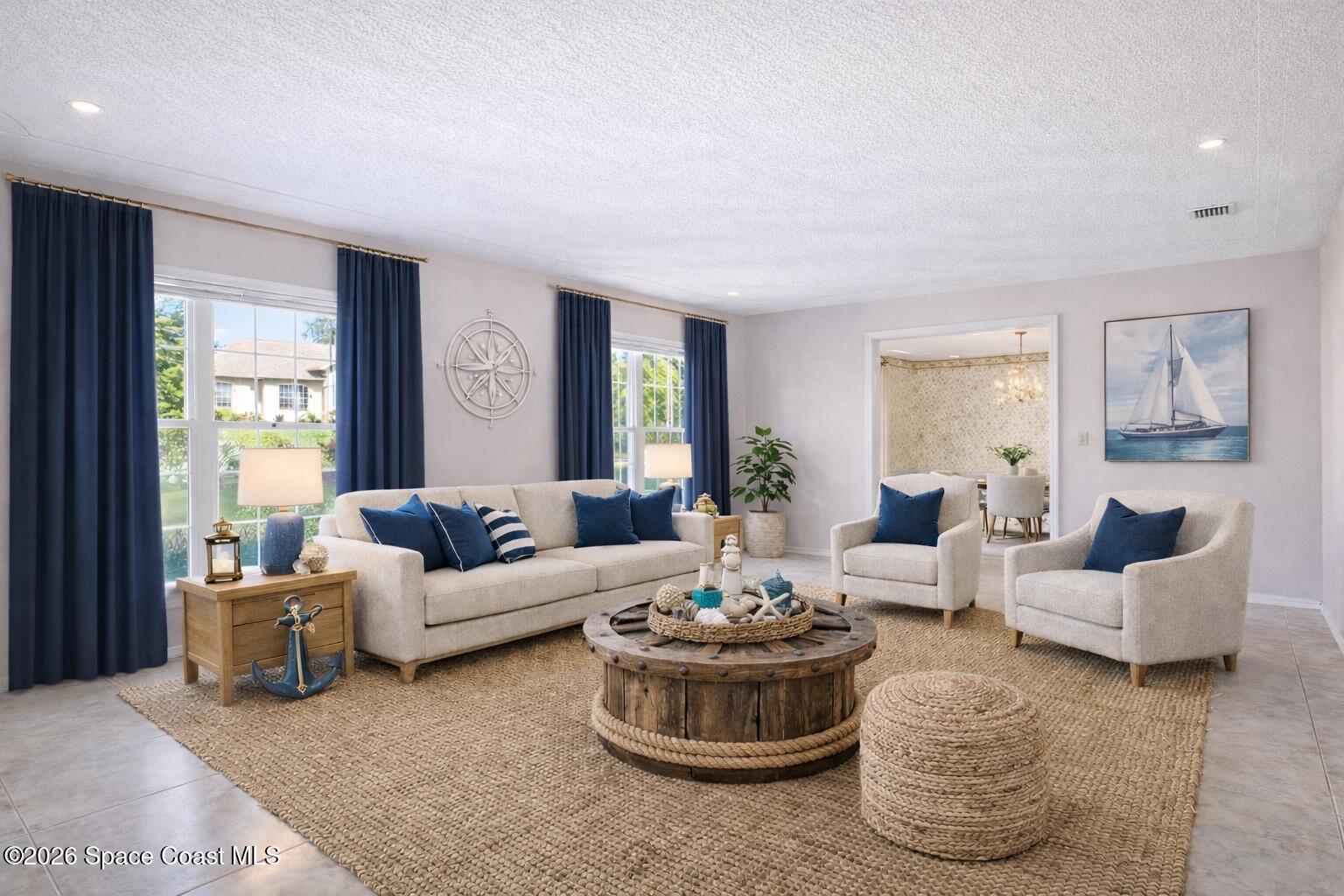 835 Sunswept Road Northeast Palm Bay, FL 32905 - Photo 6 of 36 a living room with furniture and a large window