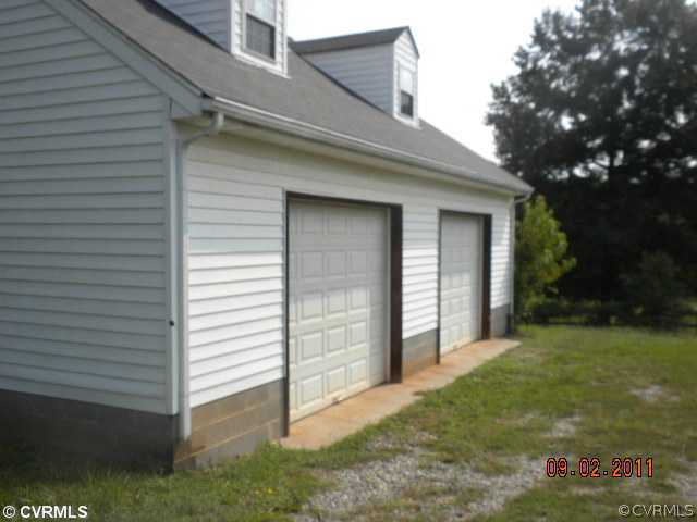1230 Quail Run Road Powhatan, VA 23139 - Photo 4 of 12 Exterior Back - Detached Garage in addition to the