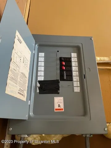 a view of living room with a large window