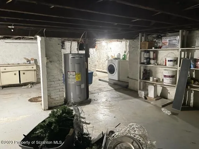 a view of a storage room and utility room