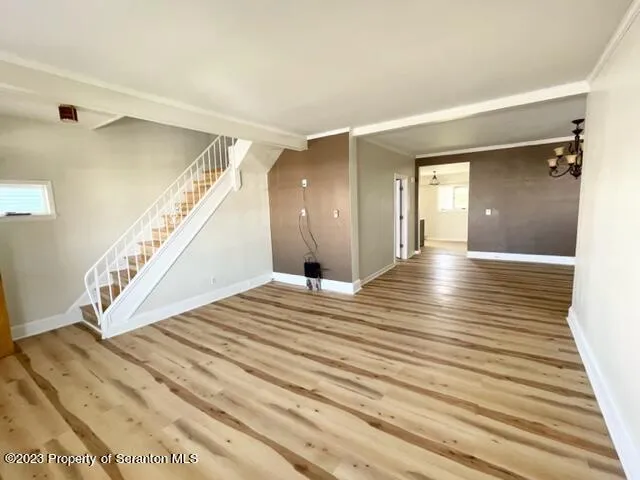 a view of a hallway view with staircase