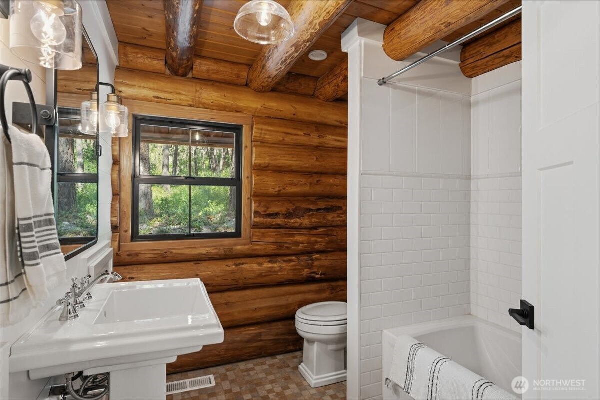 2350 First Crk Road Chelan, WA 98816 - Photo 25 of 39 a bathroom with a sink toilet and shower