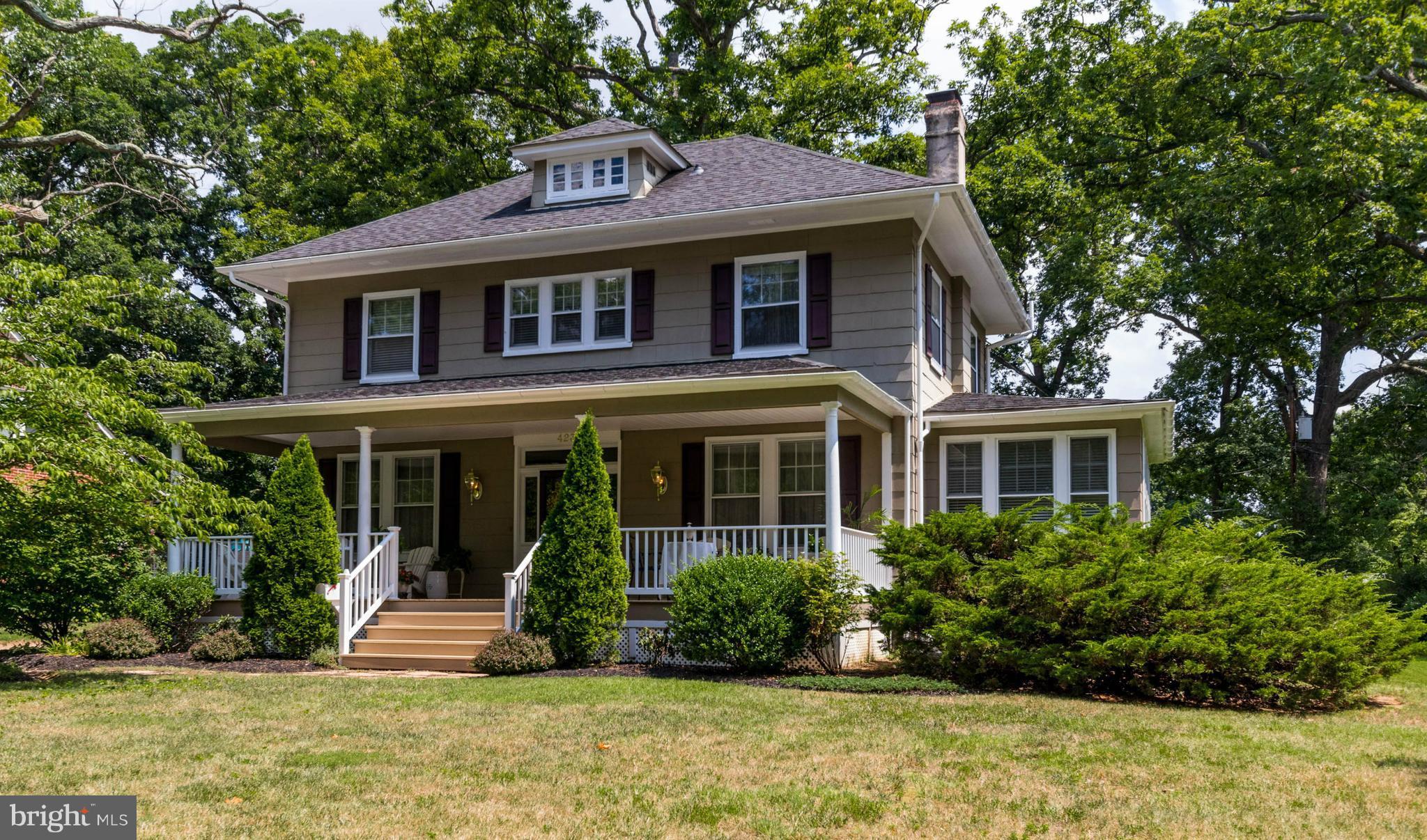 423 South Rolling Road Baltimore, MD 21228 - Photo 1 of 30 a front view of a house with a yard