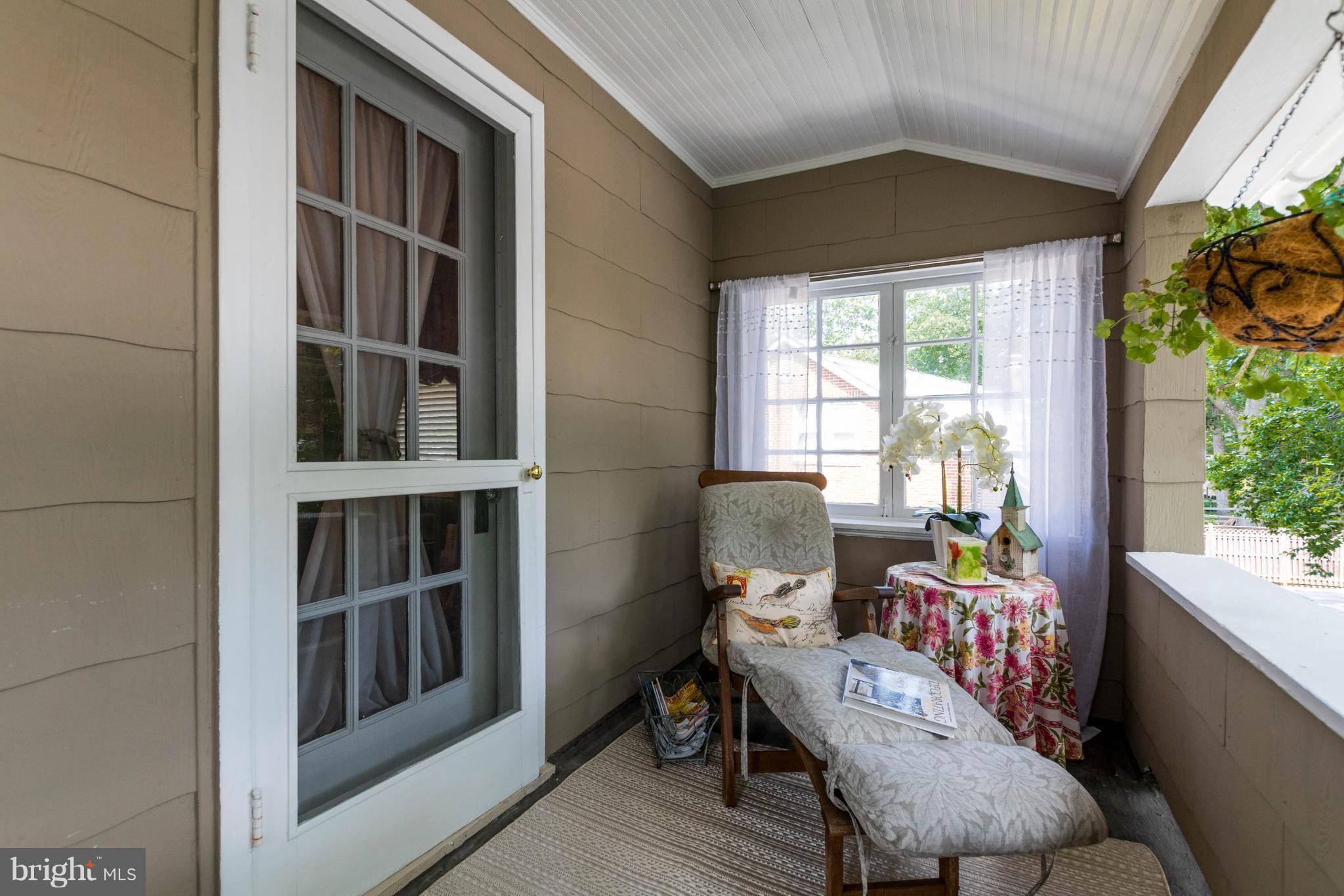 423 South Rolling Road Baltimore, MD 21228 - Photo 20 of 30 a view of a workspace with furniture and a window