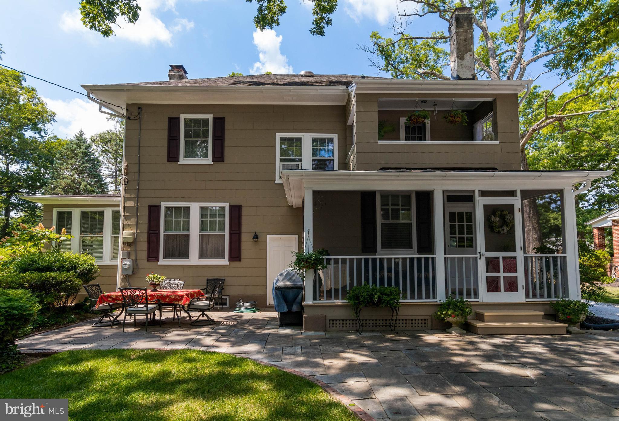 423 South Rolling Road Baltimore, MD 21228 - Photo 27 of 30 a view of a house with a yard chairs and potted plants