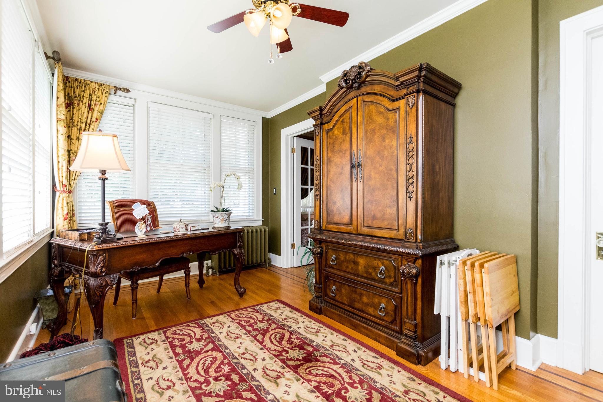423 South Rolling Road Baltimore, MD 21228 - Photo 8 of 30 a living room with furniture and a wooden floor