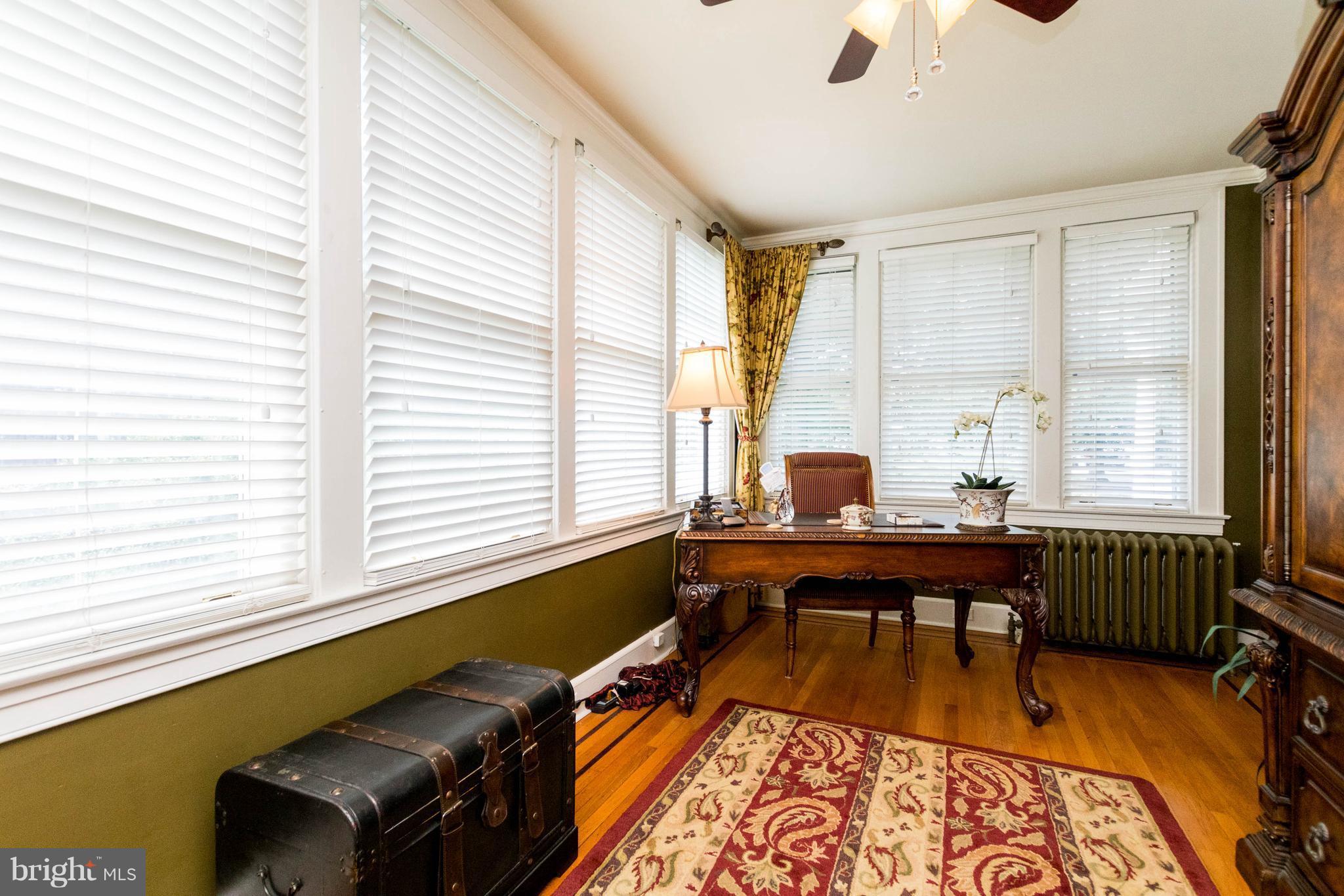 423 South Rolling Road Baltimore, MD 21228 - Photo 9 of 30 a view of a workspace with furniture and a window