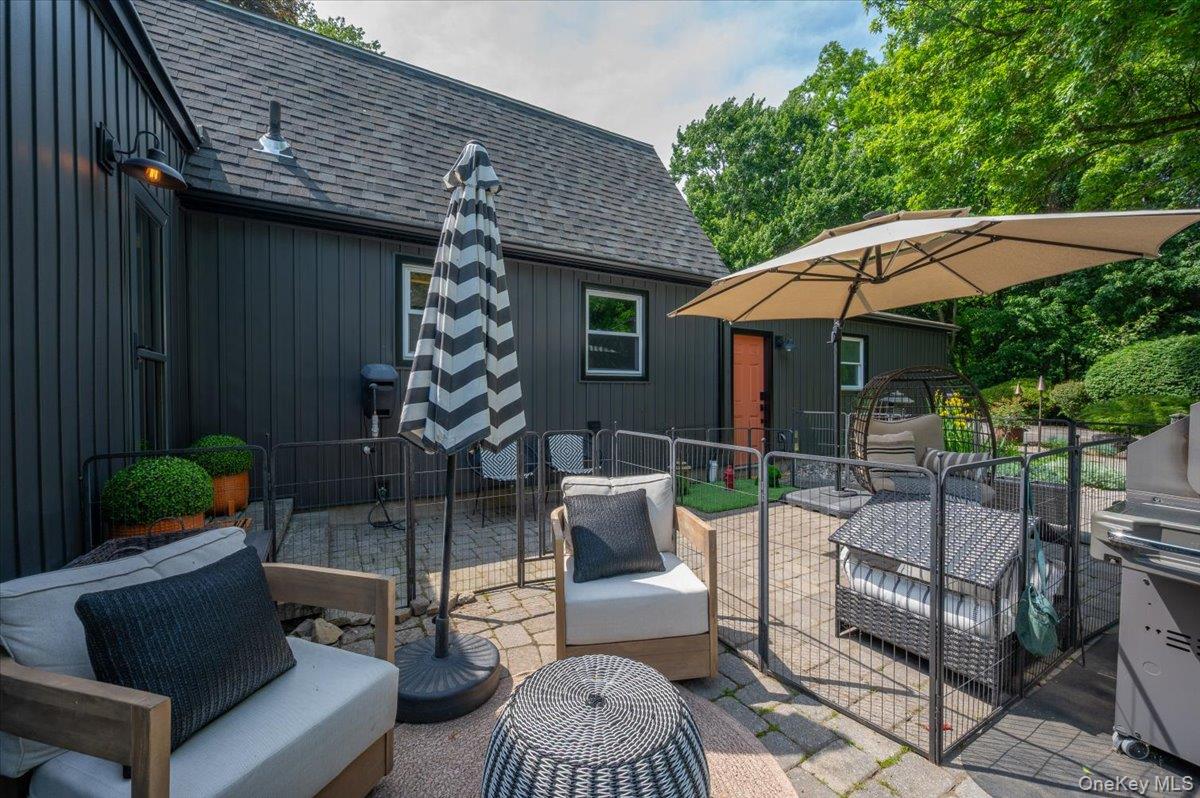 13 Jacks Pond Road Newburgh, NY 12550 - Photo 32 of 44 Expansive paver patio with multiple outdoor seating areas.