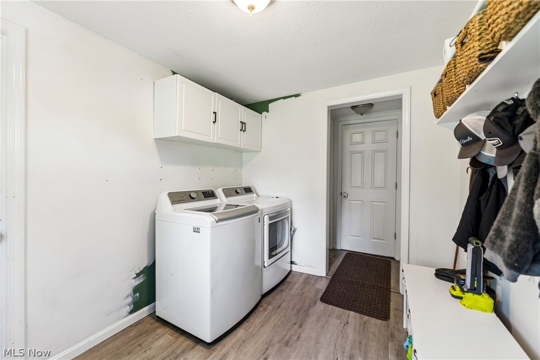 6711 Norwalk Road Medina, OH 44256 - Photo 13 of 46 First floor laundry with LVT flooring