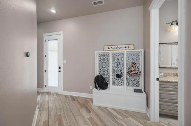 a bathroom with a bathtub and shower