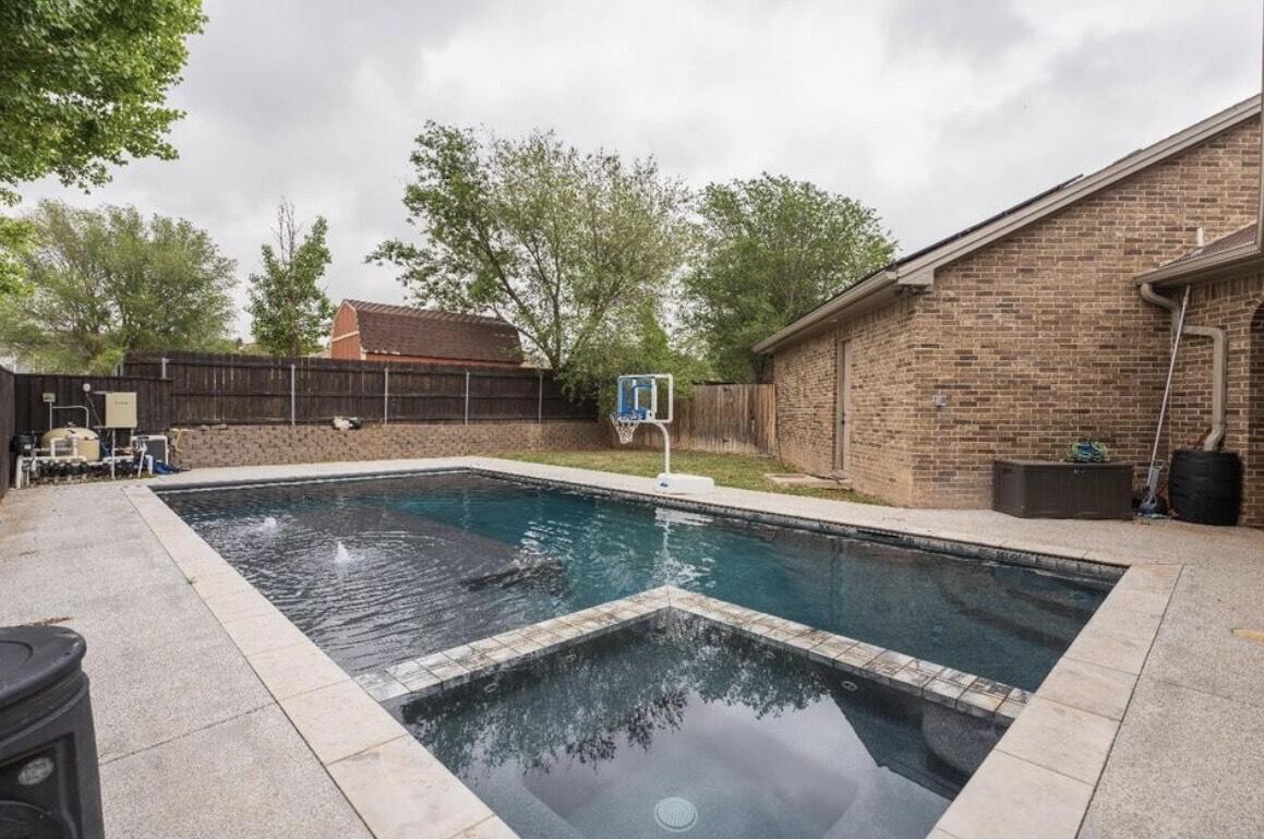 8 West Lakeshore Drive Ransom Canyon, TX 79366 - Photo 42 of 44 a view of a backyard with a patio