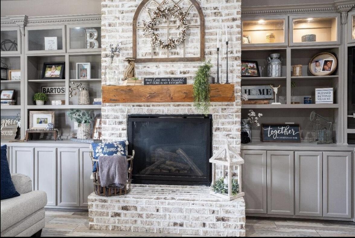 8 West Lakeshore Drive Ransom Canyon, TX 79366 - Photo 10 of 44 a kitchen with fireplace