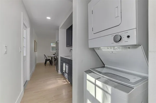a kitchen with stainless steel appliances a refrigerator and a sink