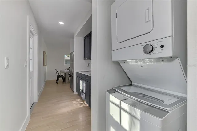 a kitchen with stainless steel appliances a refrigerator and a sink