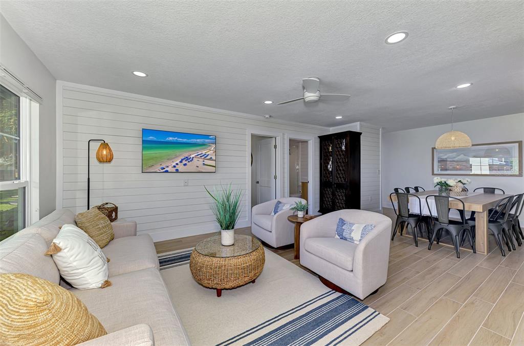 1100 Point Of Rocks Road Sarasota, FL 34242 - Photo 30 of 53 a living room with furniture and wooden floor