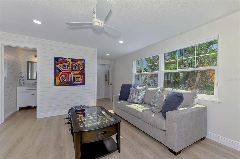 1100 Point Of Rocks Road Sarasota, FL 34242 - Photo 37 of 53 a living room with furniture and a window